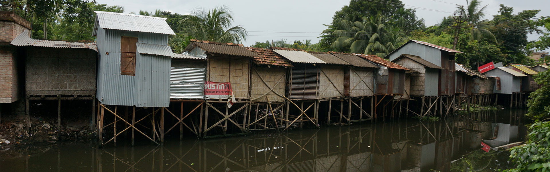 Back of shops along main road.